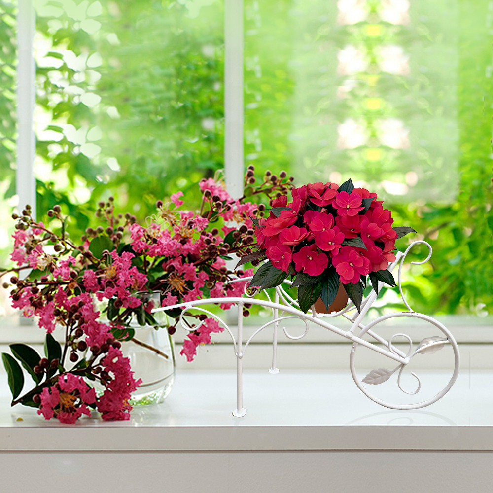 Кованая подставка велосипед для цветов